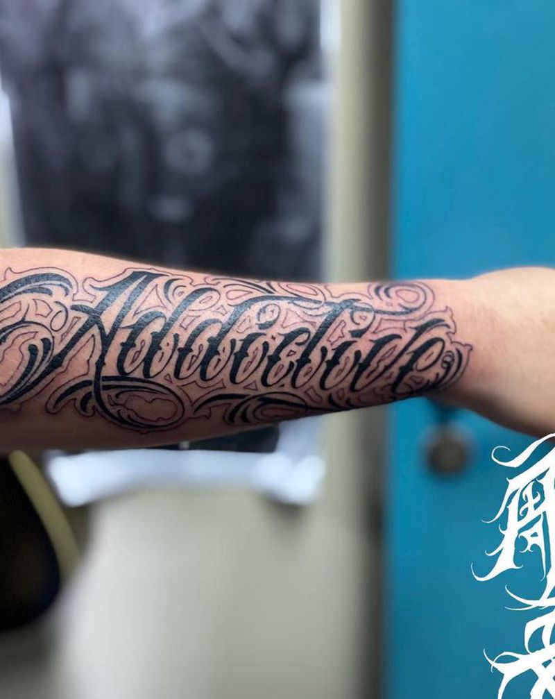 字纹身图片_手臂花体字纹身图案