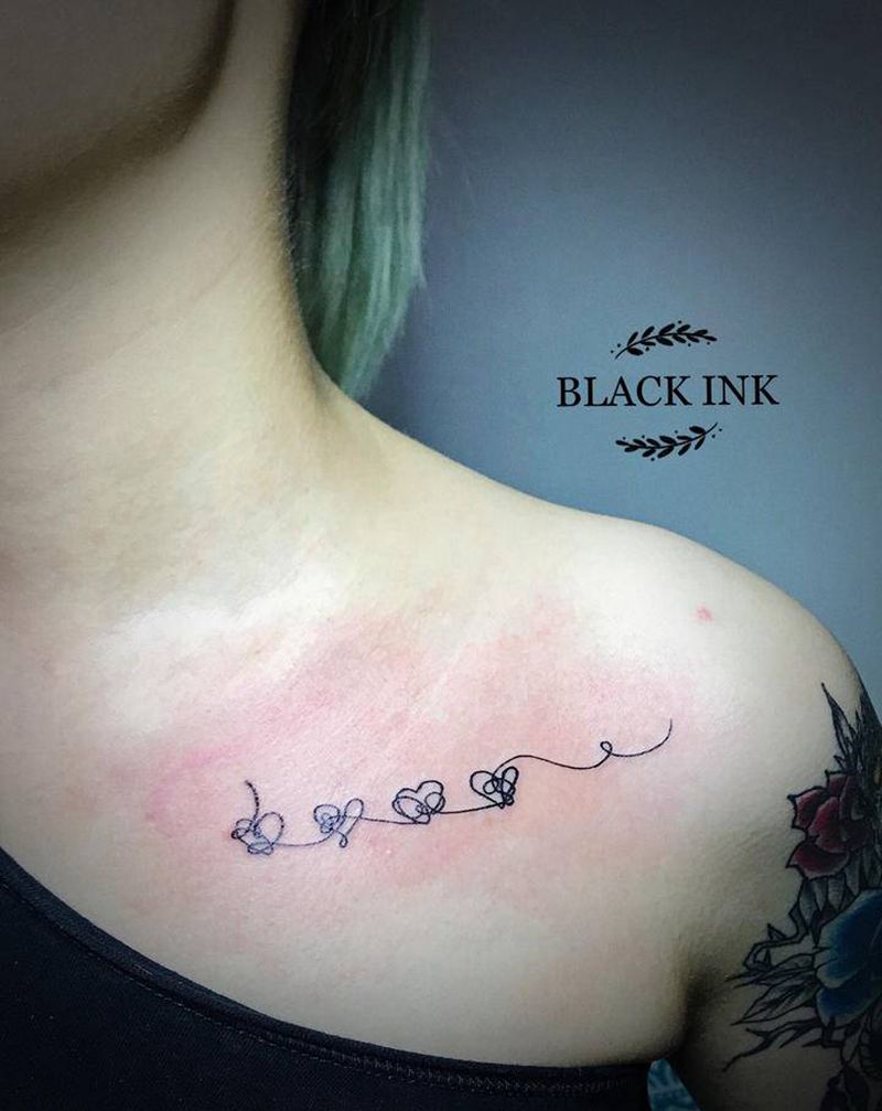 爱心纹身图片_胸部图腾纹身图案