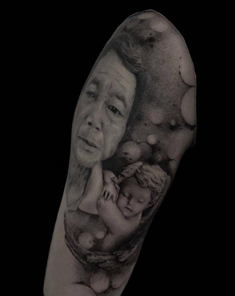 素描纹身图片_手臂欧美写实纹身图案