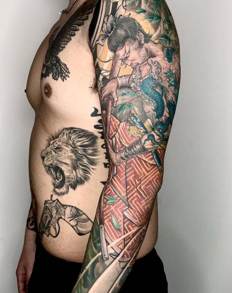 九纹龙使大劲纹身图片_手臂新传统纹身图案