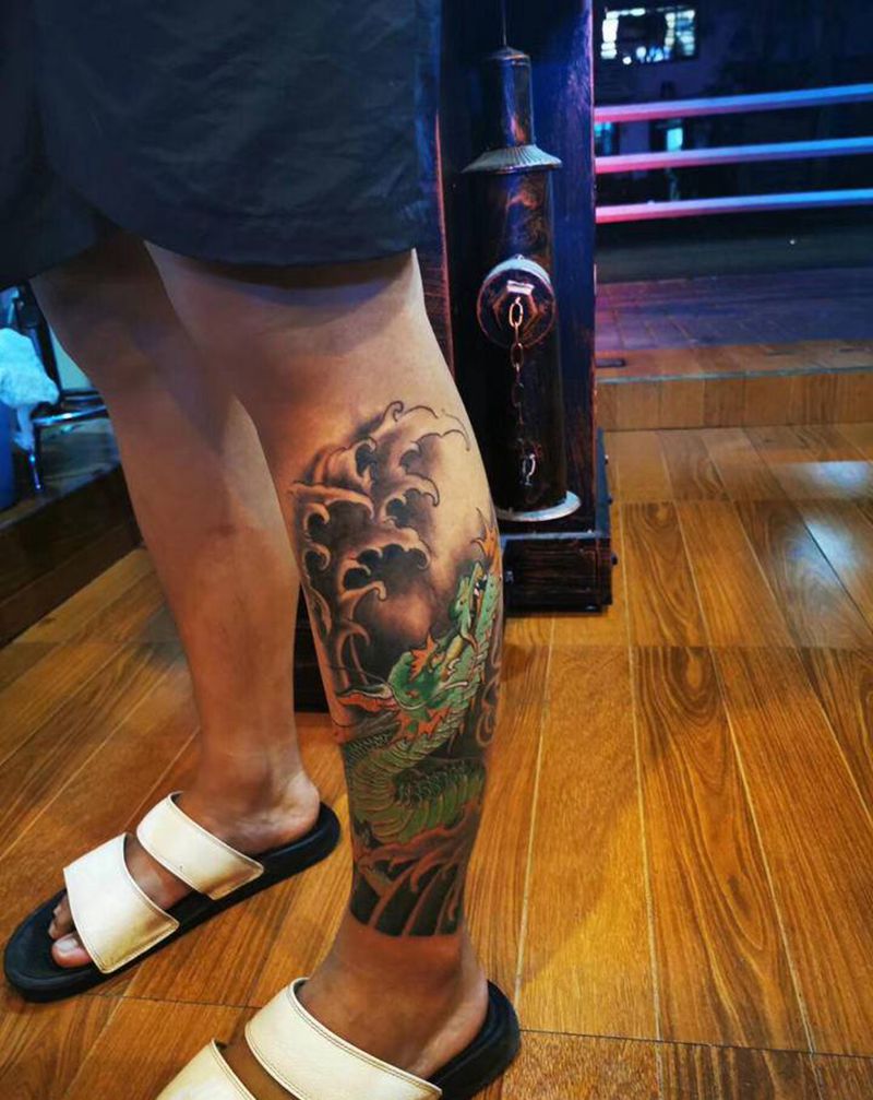 龙纹身图片_腿部新传统纹身图案
