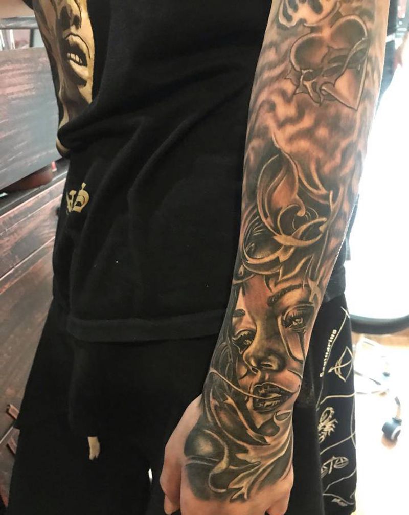 女人纹身图片_手臂欧美写实纹身图案