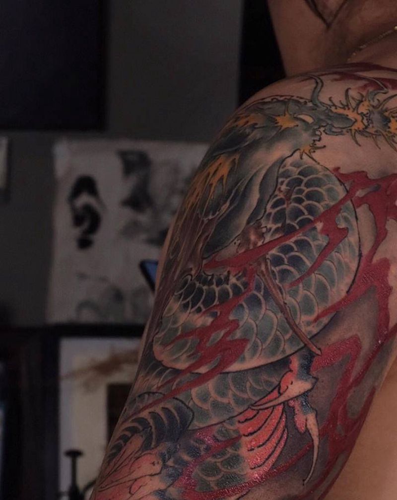 进度纹身图片_手臂新传统龙纹身图案