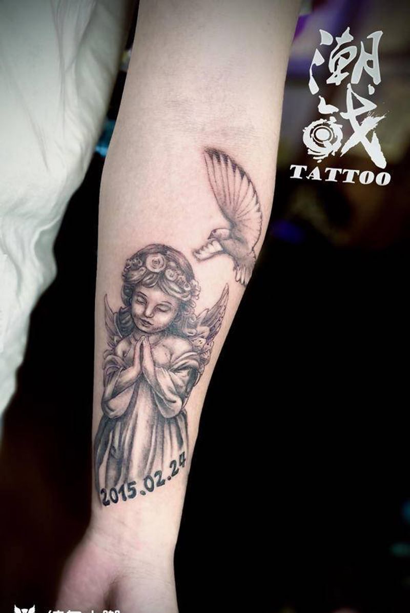 小天使纹身图片_手臂欧美写实纹身图案