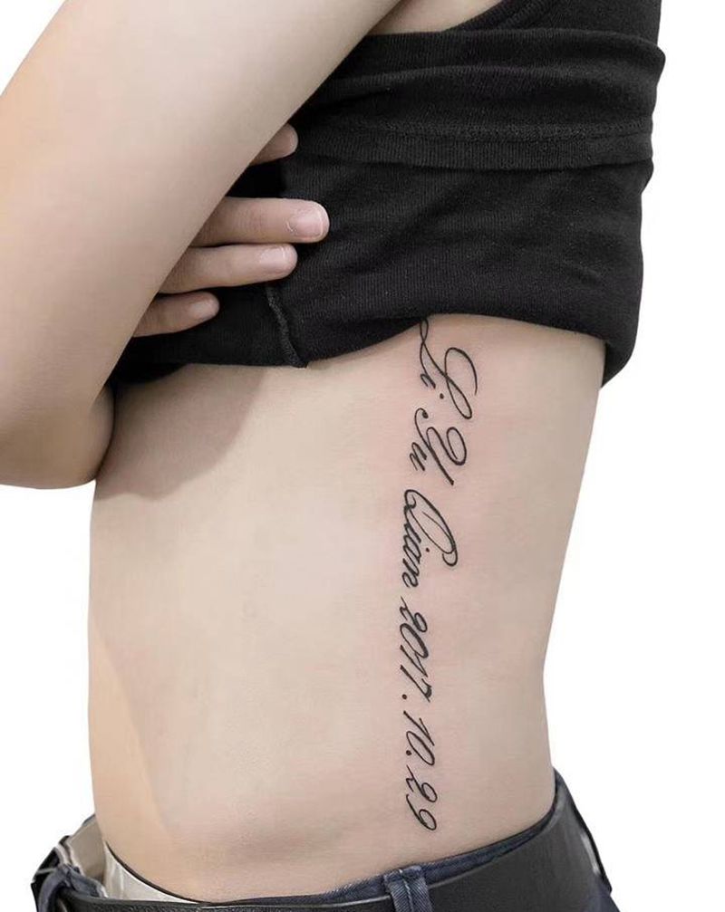 字纹身图片_腰部花体字纹身图案