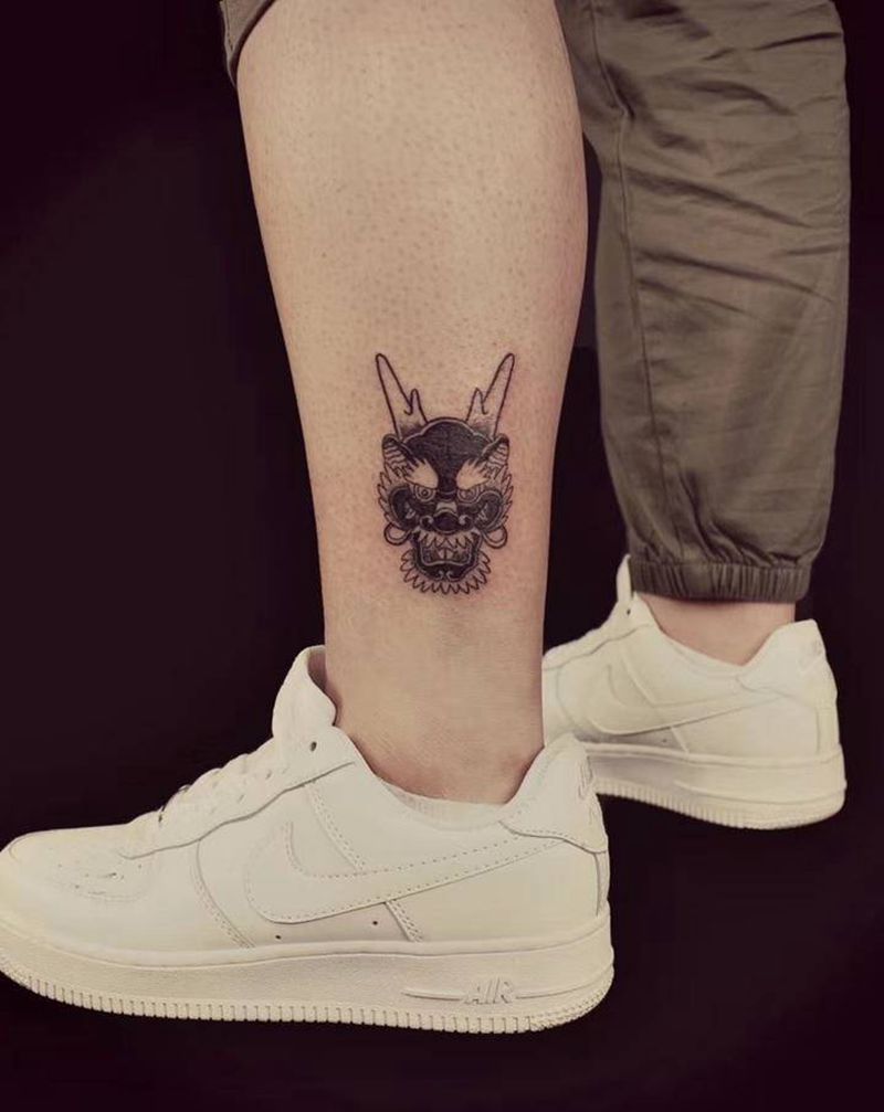 芭比龙纹身图片_腿部龙纹身图案