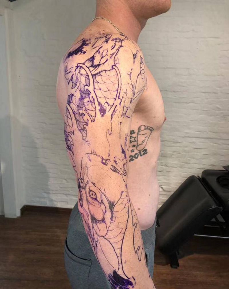 花臂鲤鱼割线纹身图片_手臂纹身图案