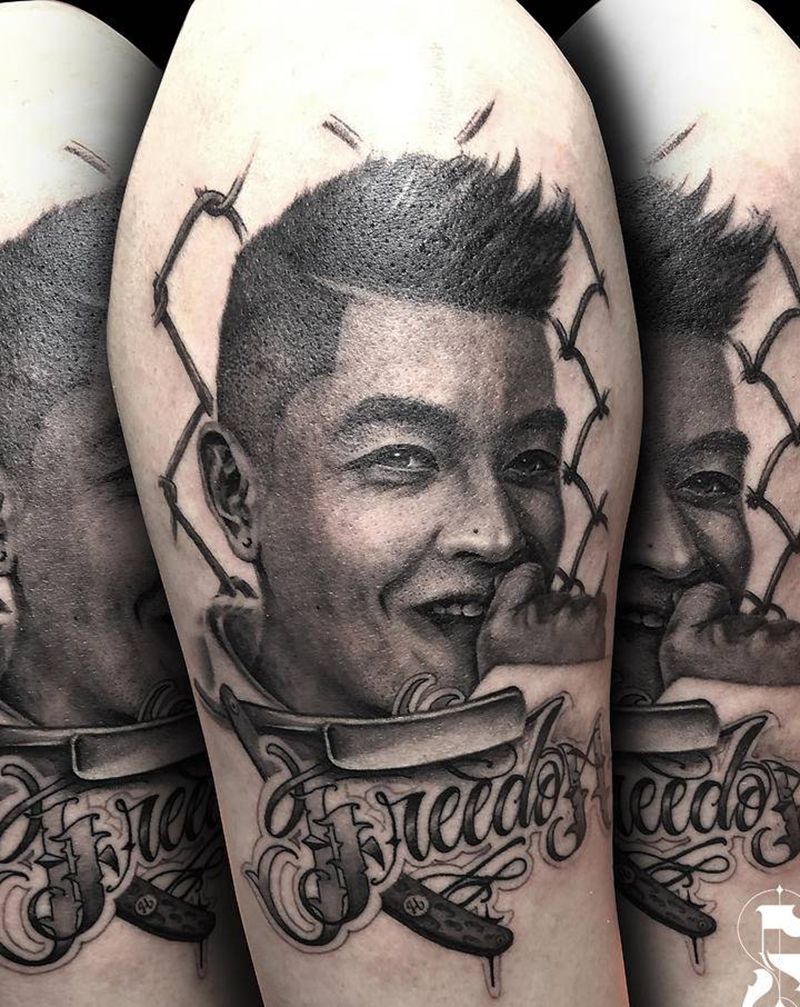 barber陈冠希纹身图片_手臂欧美写实纹身图案