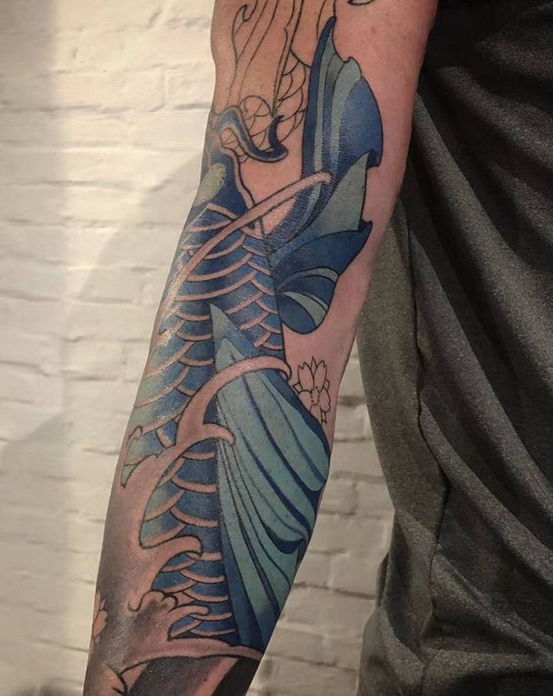 花臂：鱼，未完待续纹身图片_手臂老传统纹身图案