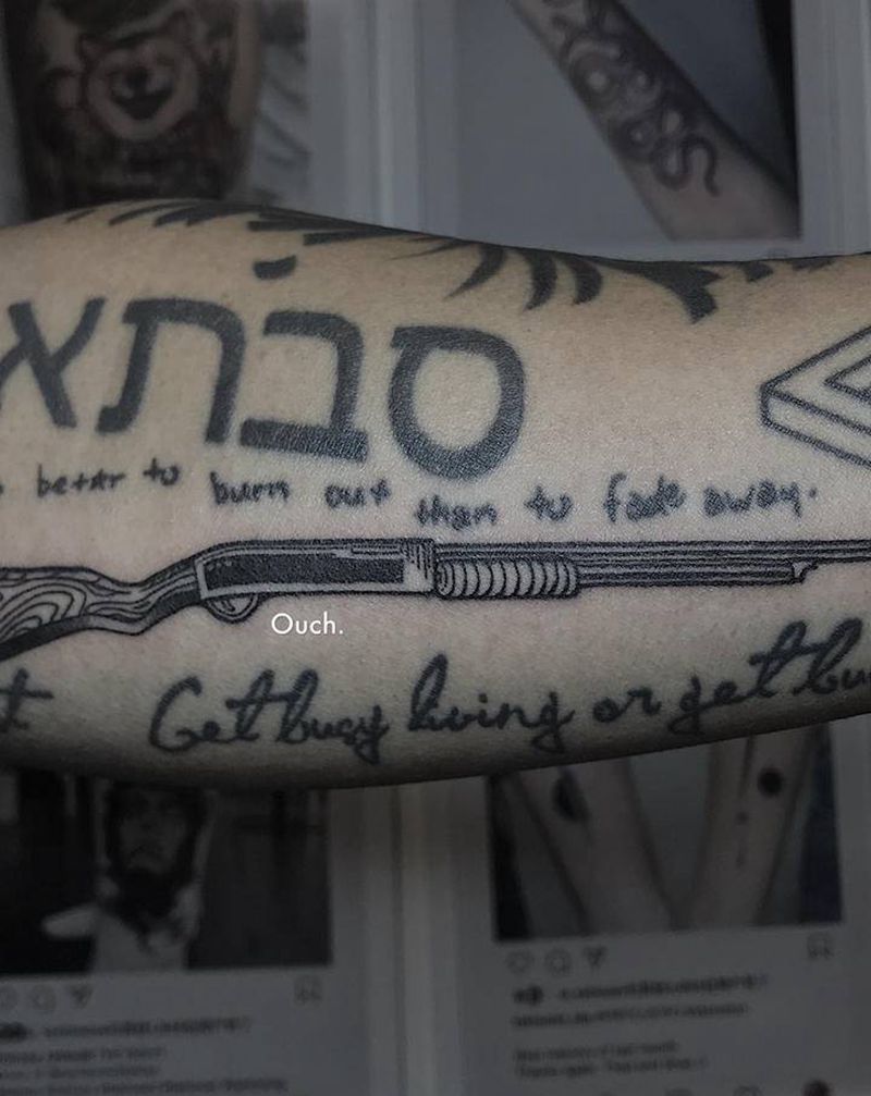 玩具枪纹身图片_手臂纹身图案