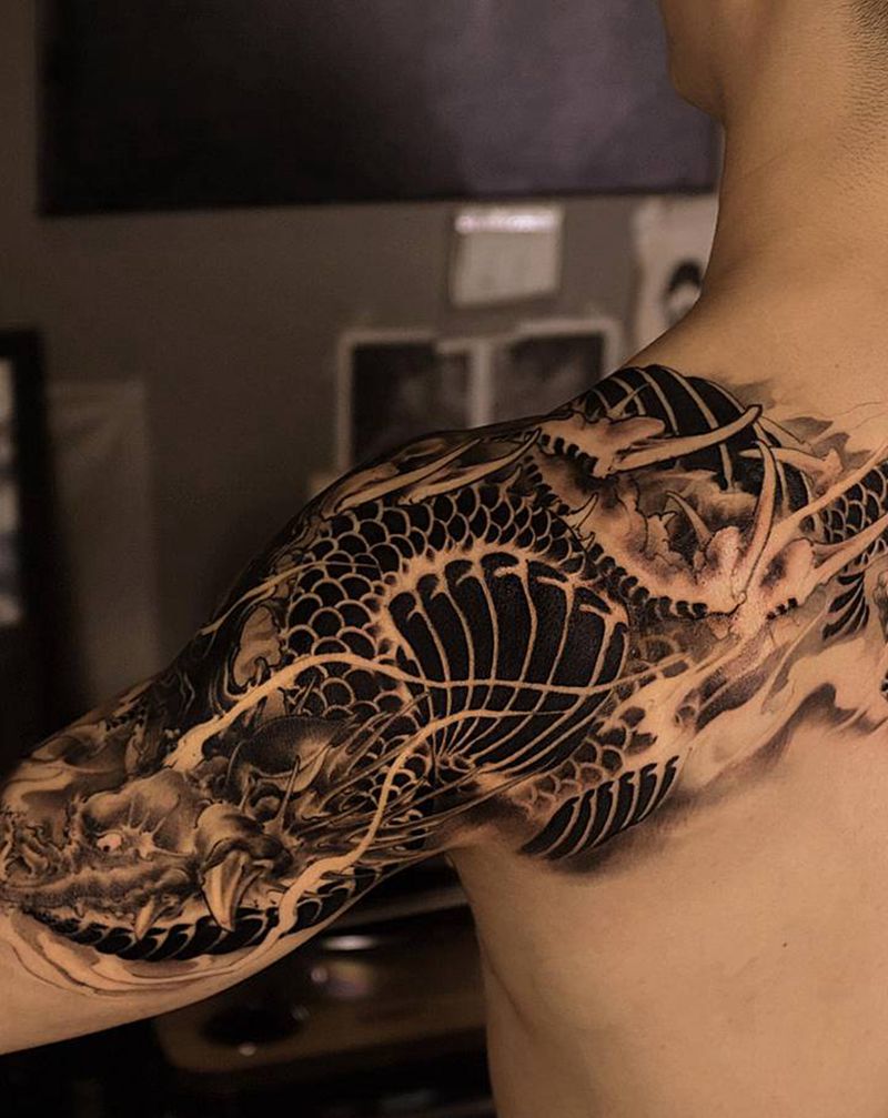 龙纹身图片_手臂肩部新传统欧美写实纹身图案