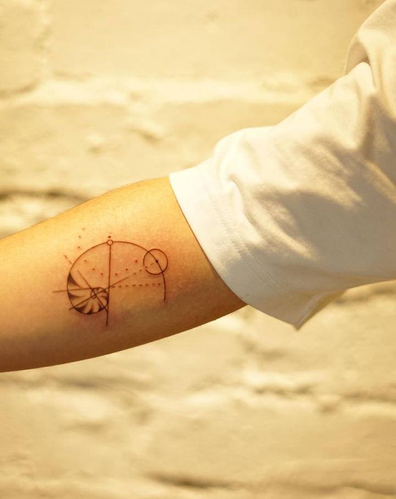 海螺纹身图片_手臂纹身图案