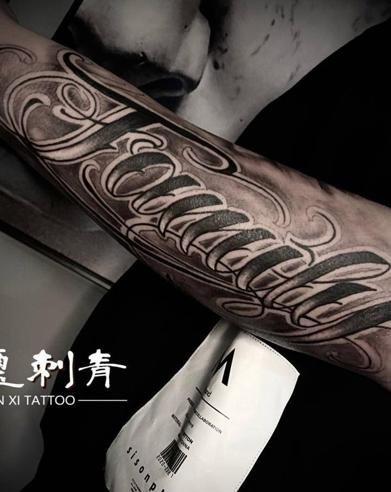 花体字纹身图片_手臂花体字纹身图案