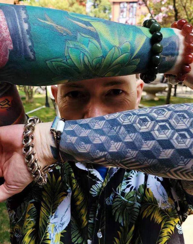 买家秀纹身图片_手臂图腾几何纹身图案