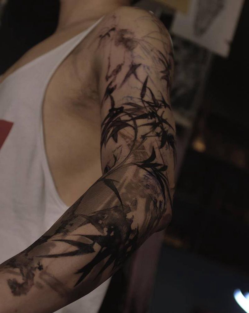 _娑婆间 •进度纹身图片_手臂水彩图腾纹身图案