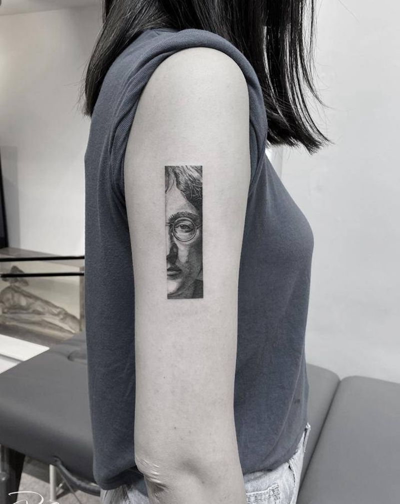 约翰列侬纹身图片_手臂欧美写实几何单针纹身图案