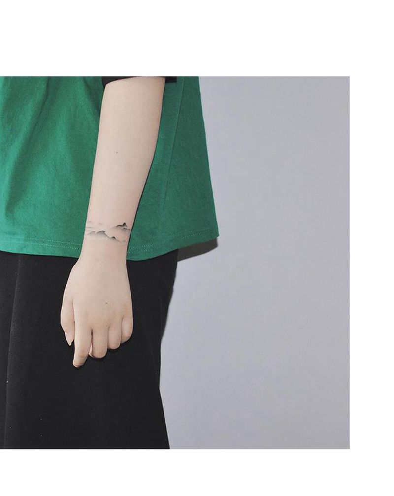 山水纹身图片_手臂纹身图案