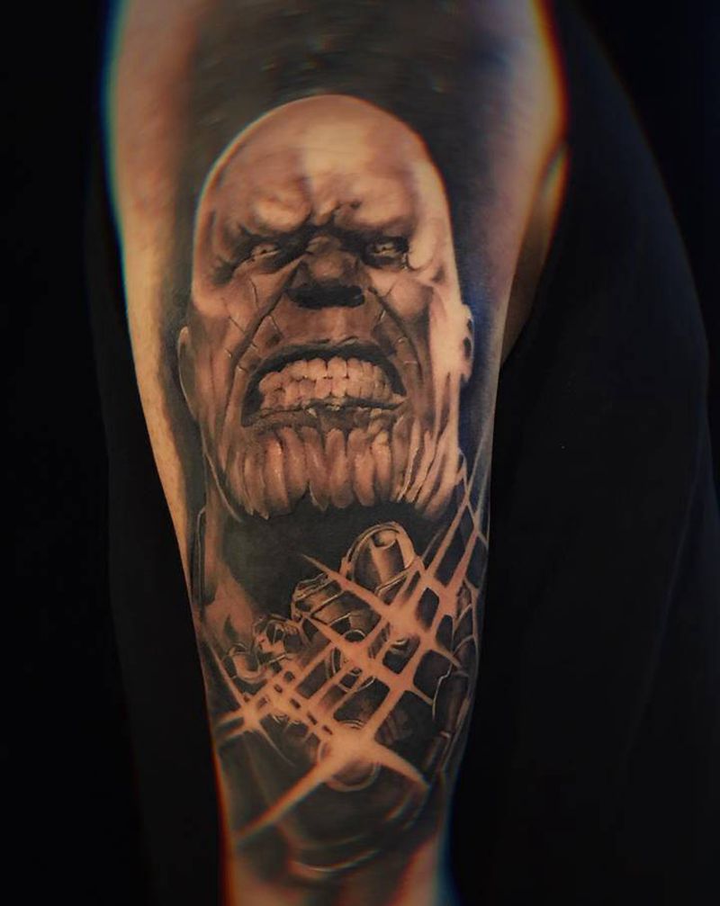 灭霸纹身图片_手臂欧美写实纹身图案