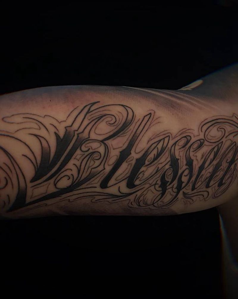 奇卡诺字体纹身图片_手臂花体字纹身图案