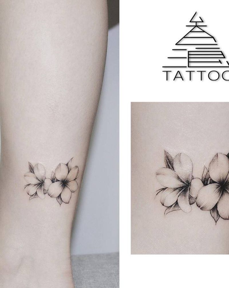 遮疤纹身图片_腿部纹身图案