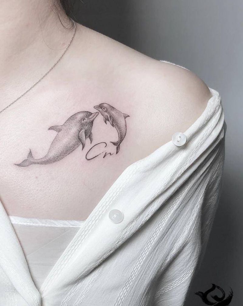 海豚纹身图片_几何点刺纹身图案