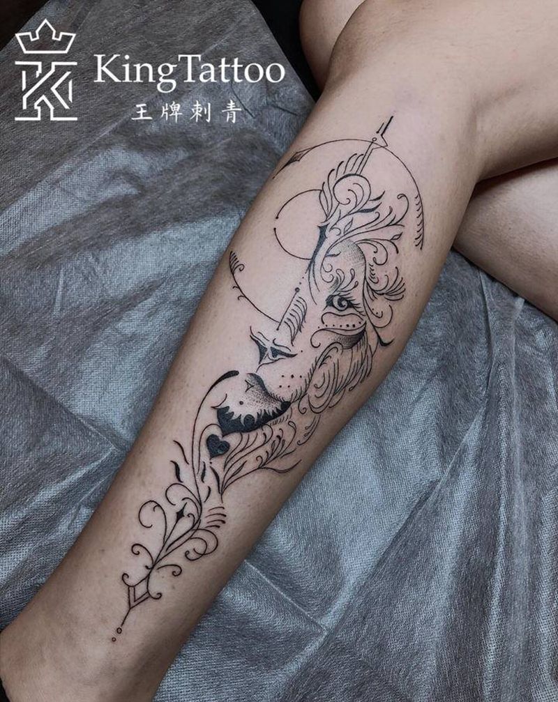 小腿狮子纹身图片_腿部点刺狮子纹身图案