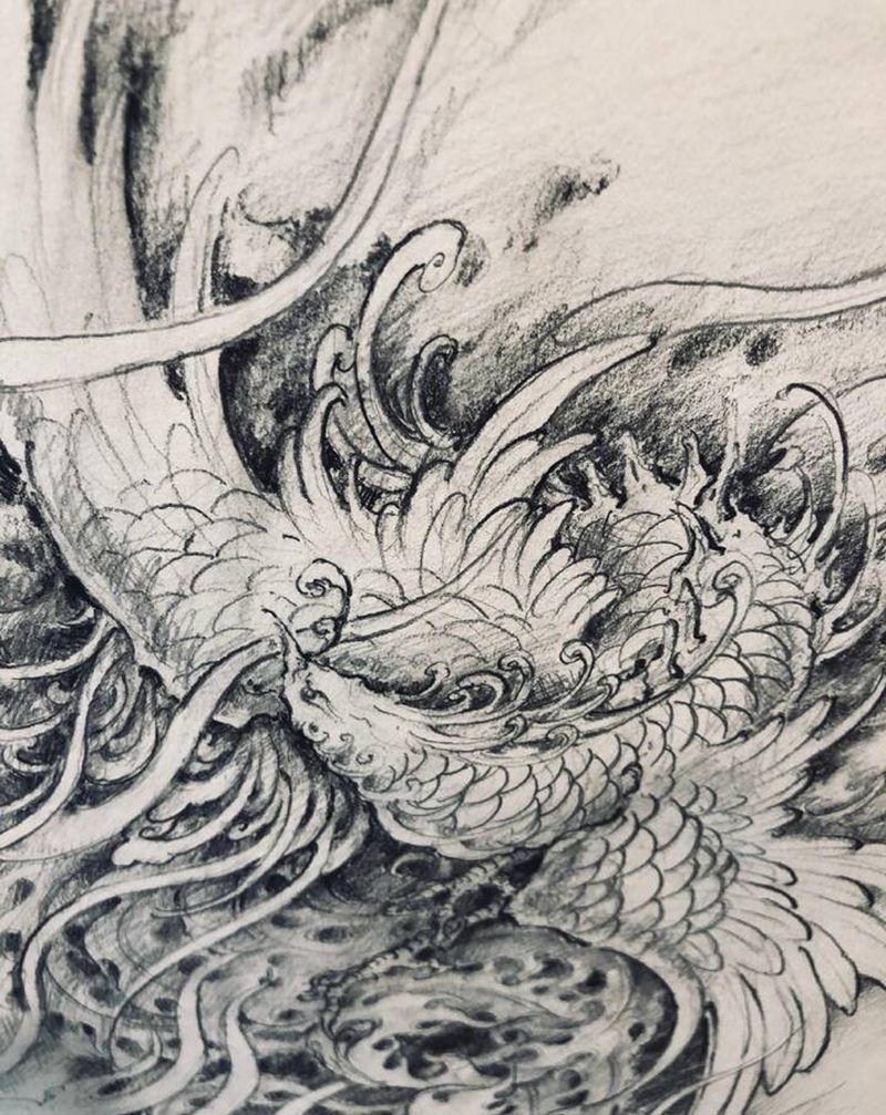 凤凰涅槃纹身图片_手臂新传统纹身图案