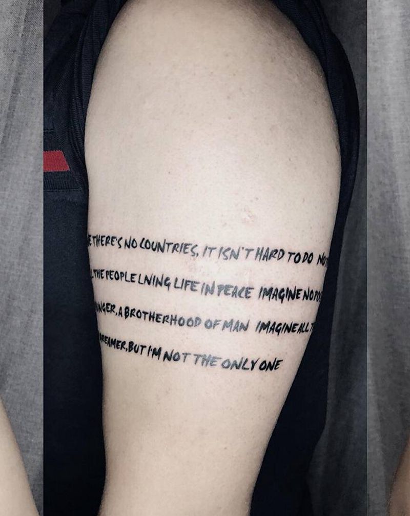 一首歌纹身图片_手臂水墨字体纹身图案