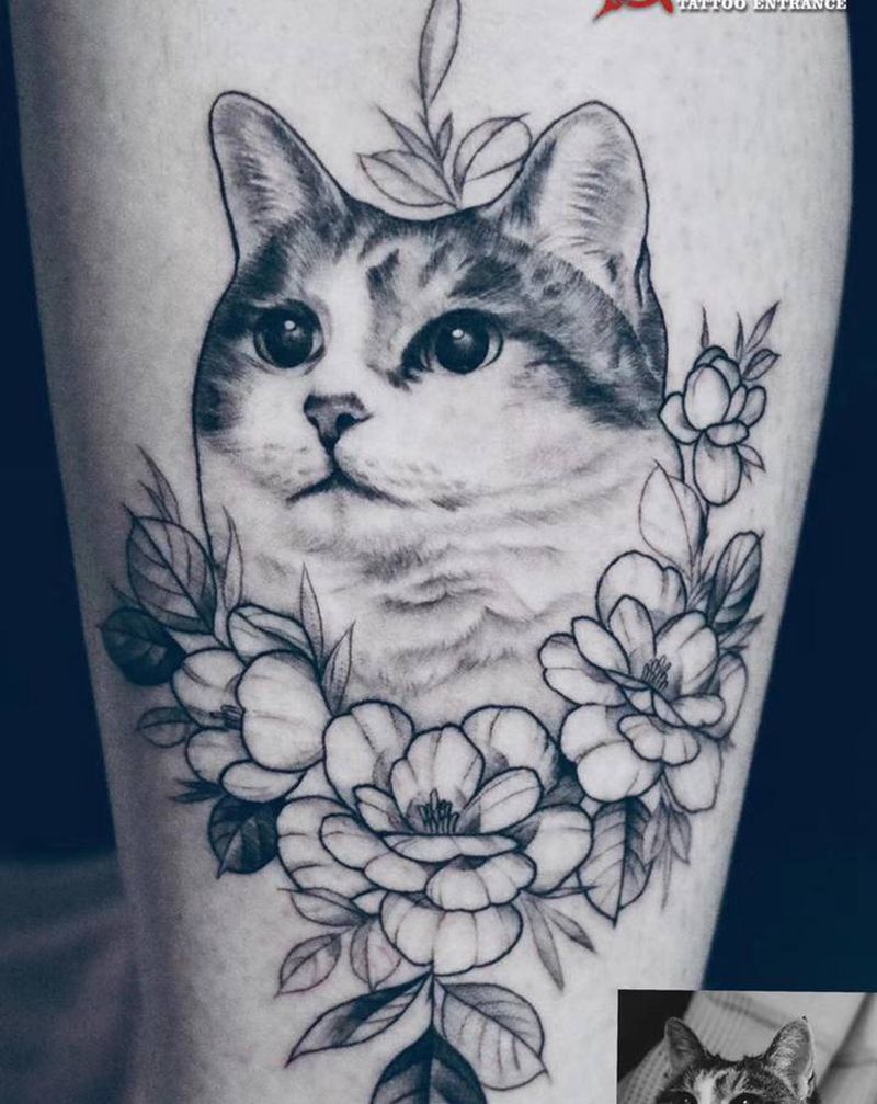 喵星人纹身图片_腿部点刺欧美写实猫纹身图案