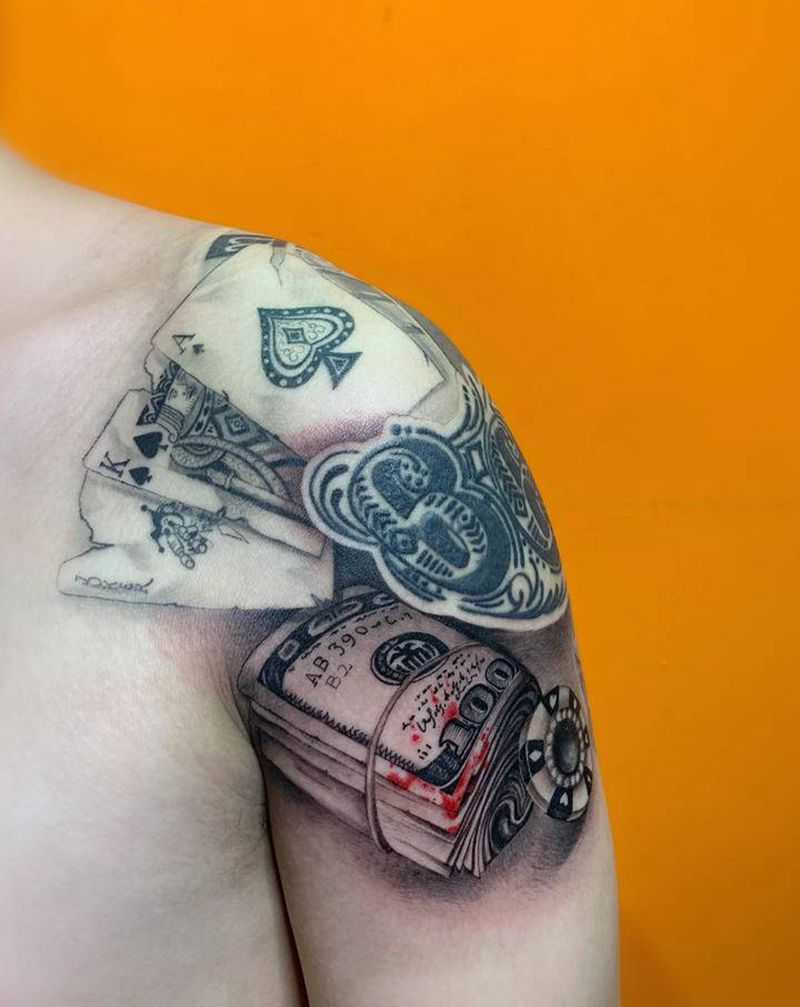 搞钱纹身图片_肩部欧美写实纹身图案