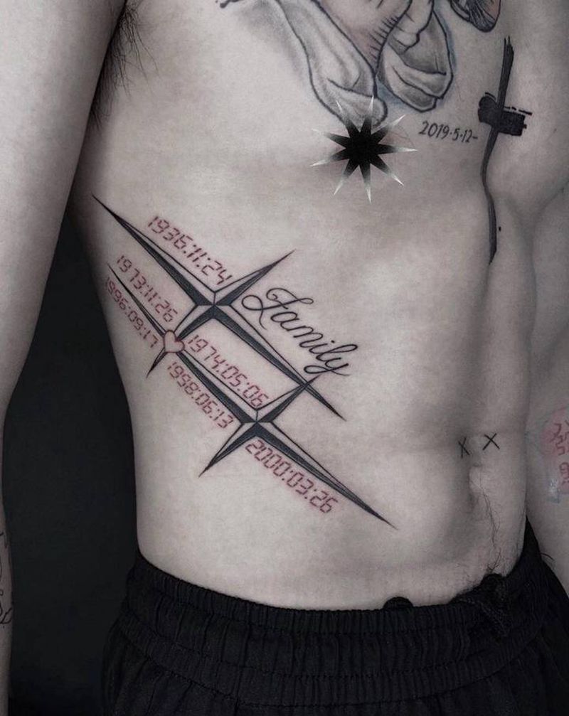 双星纹身图片_腰部花体字纹身图案