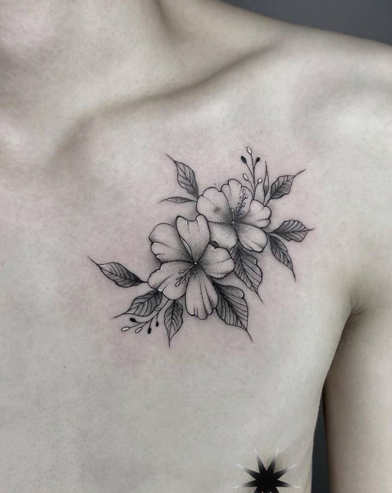 小素花纹身图片_胸部点刺纹身图案