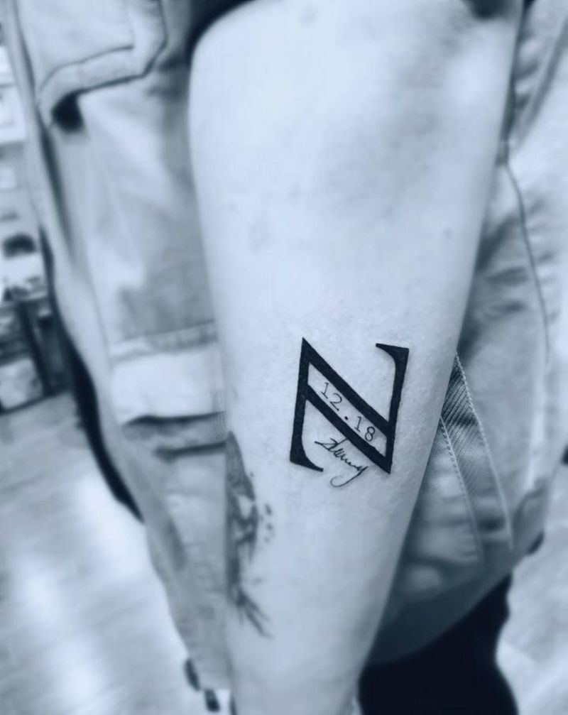 客户自己设计的手写体纹身图片_手臂花体字纹身图案