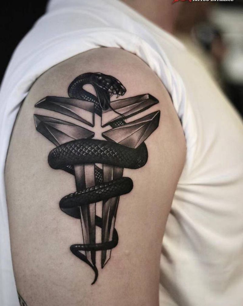 黑曼巴纹身图片_手臂欧美写实黑曼巴蛇科比纹身图案