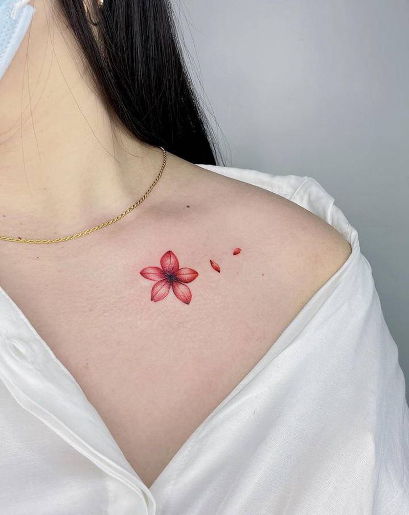 锁骨小花儿纹身图片_颈部肩部水彩水墨纹身图案