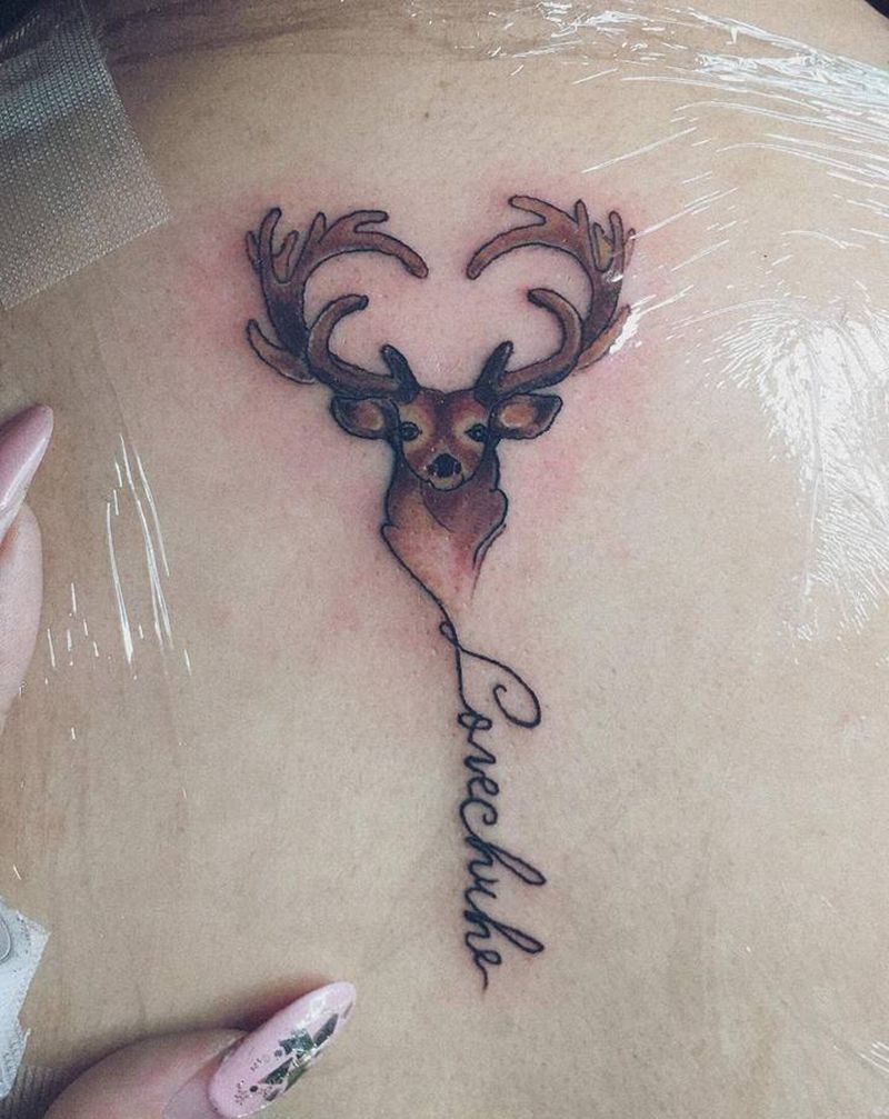 小清新鹿头纹身图片_背部纹身图案