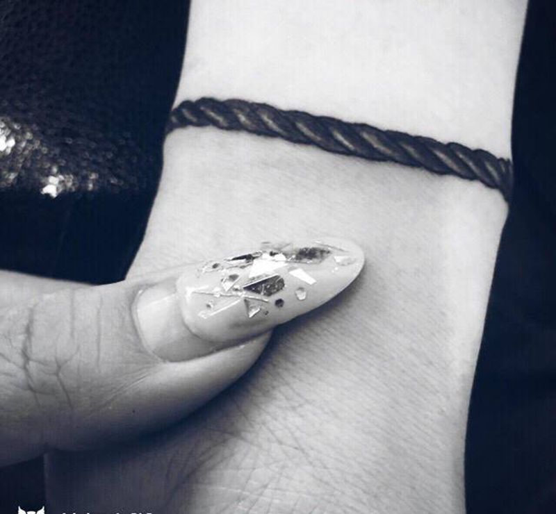 绳结纹身图片_手部纹身图案