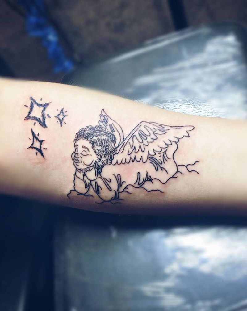 小天使纹身图片_手臂纹身图案