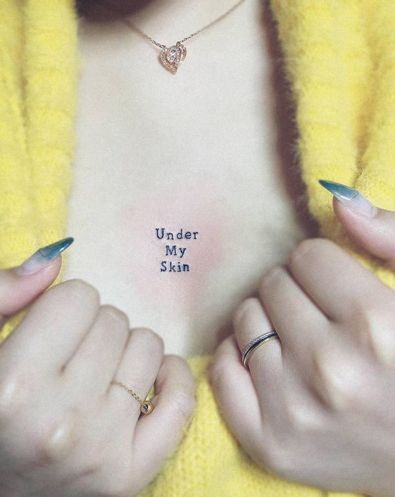 under my skin纹身图片_胸部纹身图案