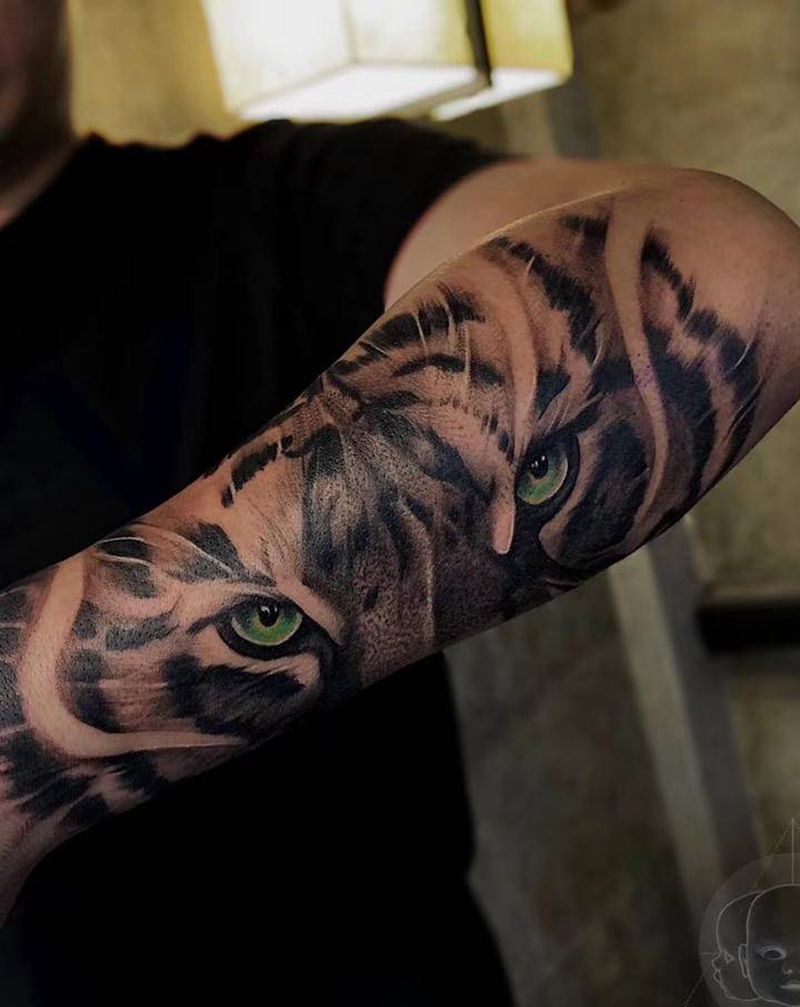 老虎眼睛纹身图片_手臂欧美写实纹身图案