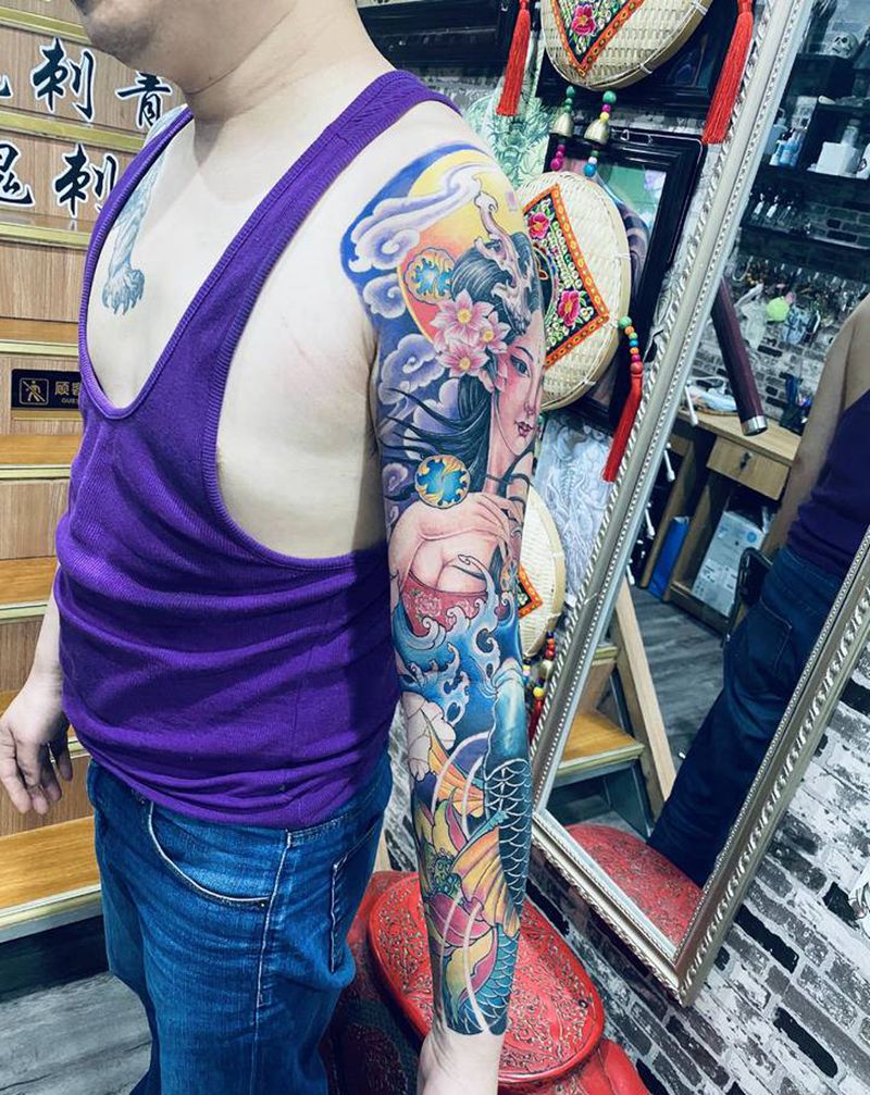 龙女花臂纹身图片_手臂新传统纹身图案