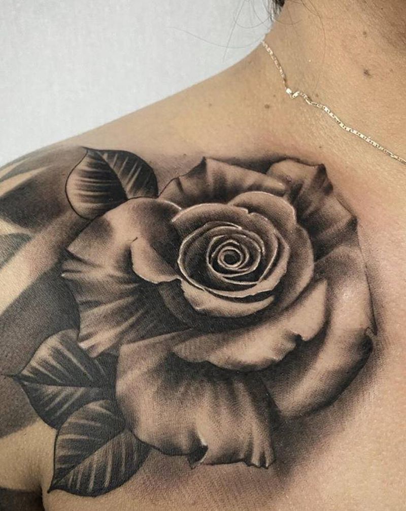 黑灰写实玫瑰纹身图片_胸部欧美写实玫瑰纹身图案