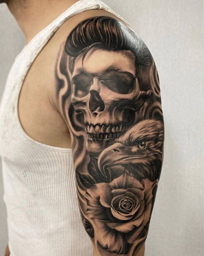 骷髅鹰玫瑰纹身图片_手臂腿部欧美写实骷髅 鹰玫瑰纹身图案