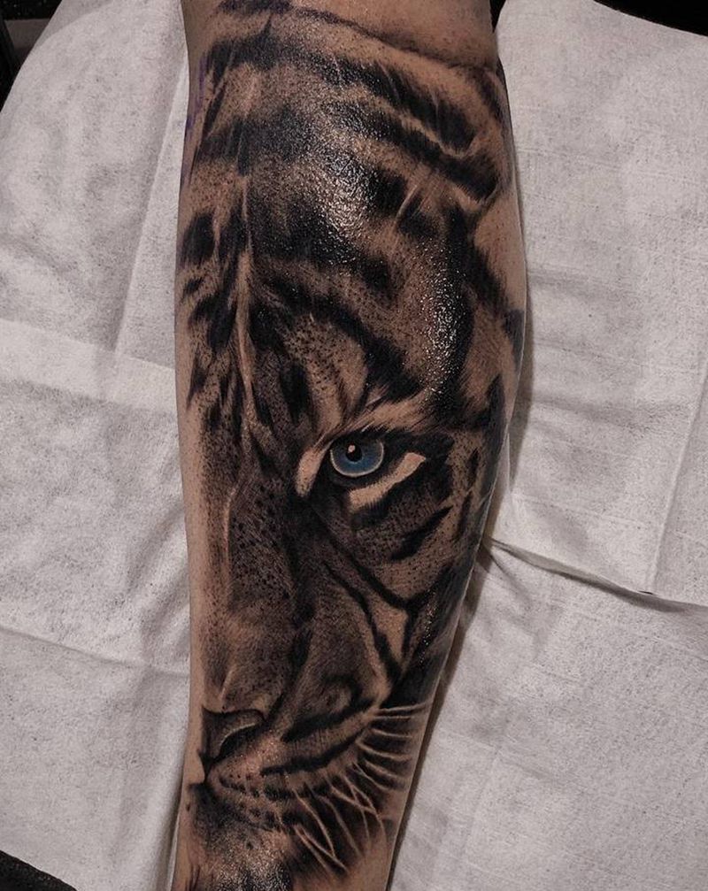 半脸老虎纹身图片_腿部手臂欧美写实纹身图案
