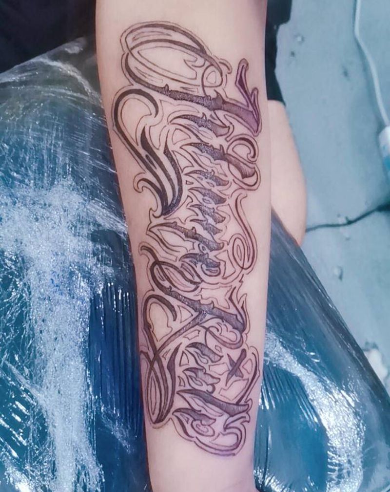 花体字纹身图片_手臂花体字纹身图案