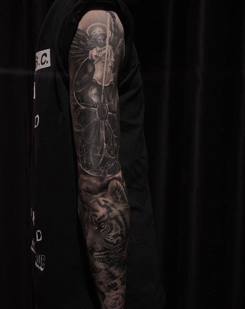 遮盖花臂纹身图片_手臂欧美写实纹身图案