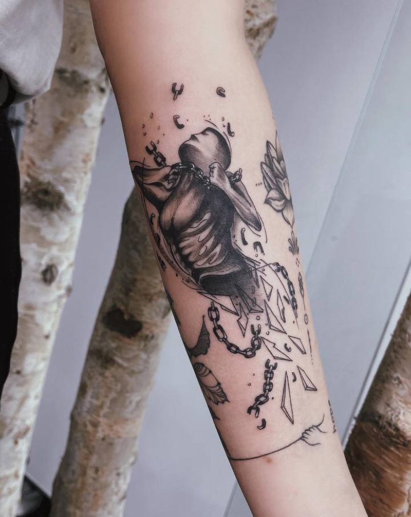 挣脱纹身图片_手臂纹身图案