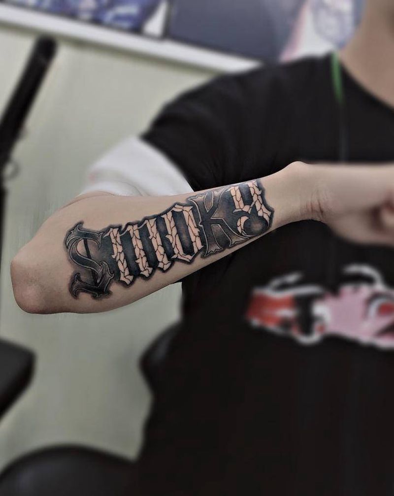 smoky纹身图片_手臂花体字纹身图案