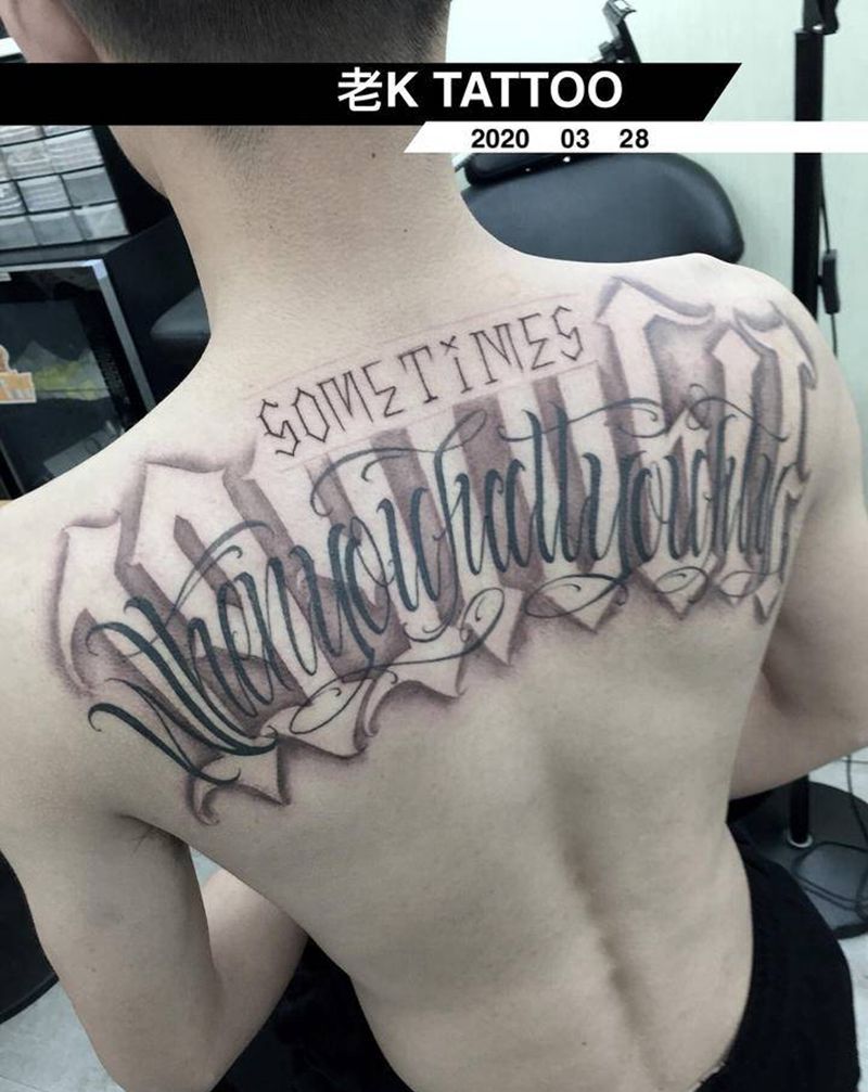 花体字纹身图片_背部花体字纹身图案