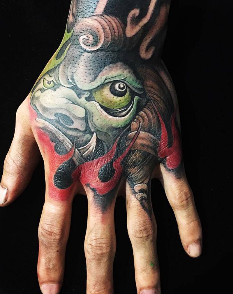 手背不动明王纹身图片_手部新传统纹身图案